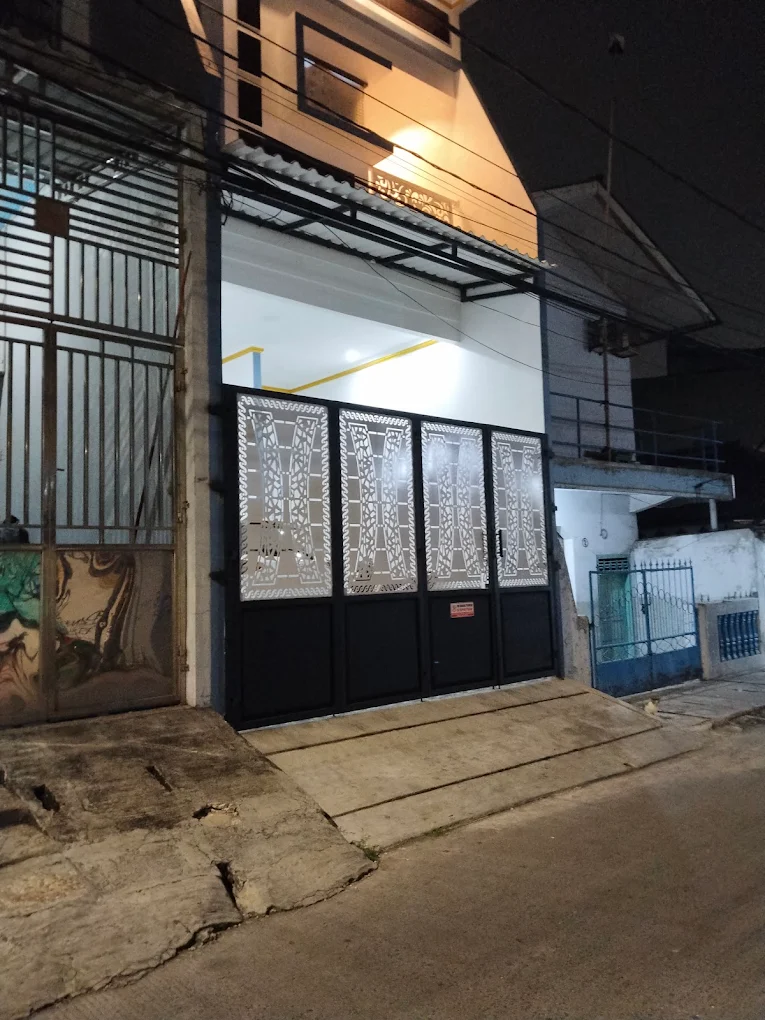 Pintu pagar besi plat cutting dan kanopi rumah minimalis karya bengkel las jakarta utara